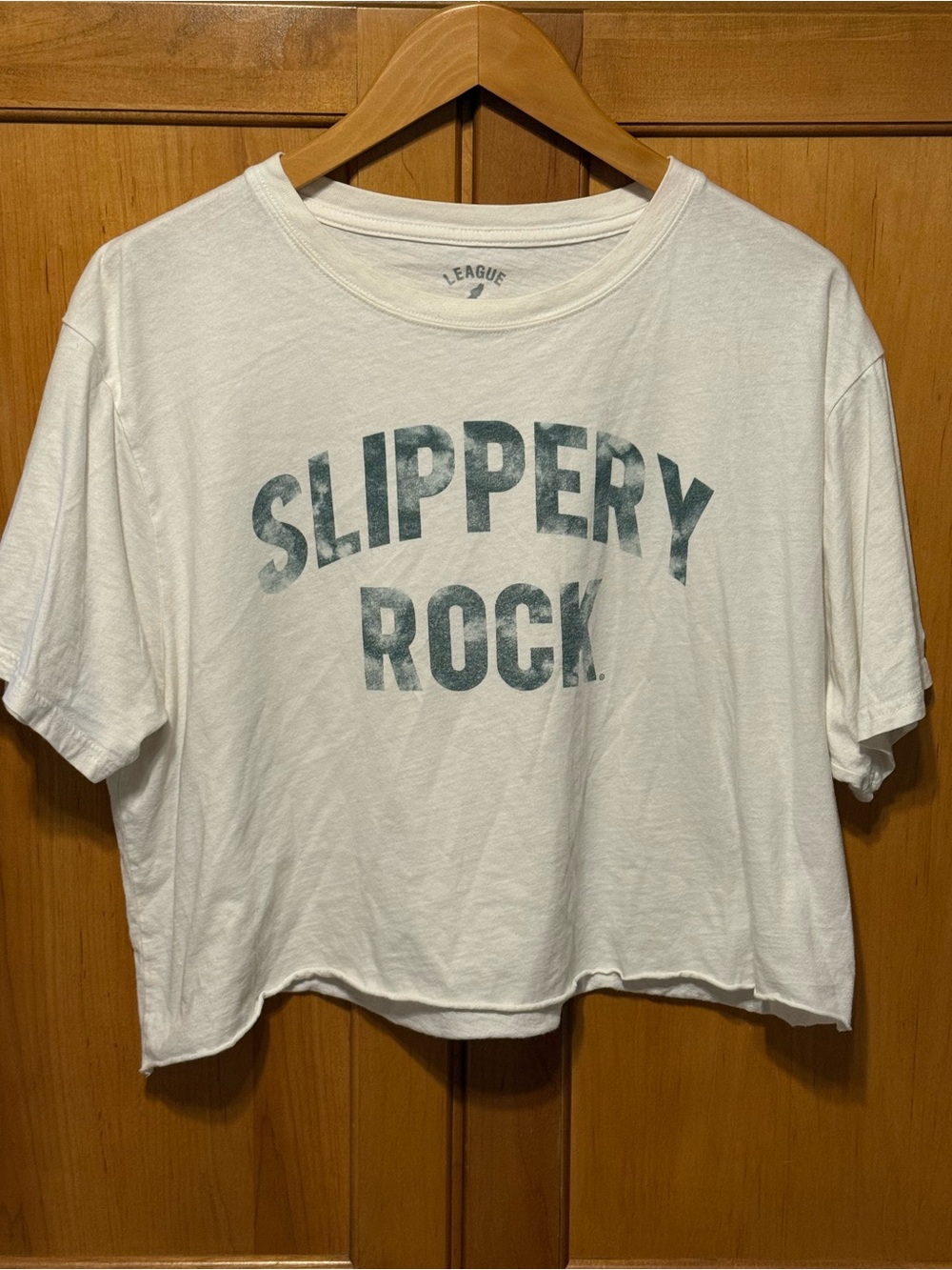 League White Cropped Tee with Teal 'SLIPPERY ROCK' Graphic
